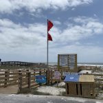 Double Red Flags on Orange Beach